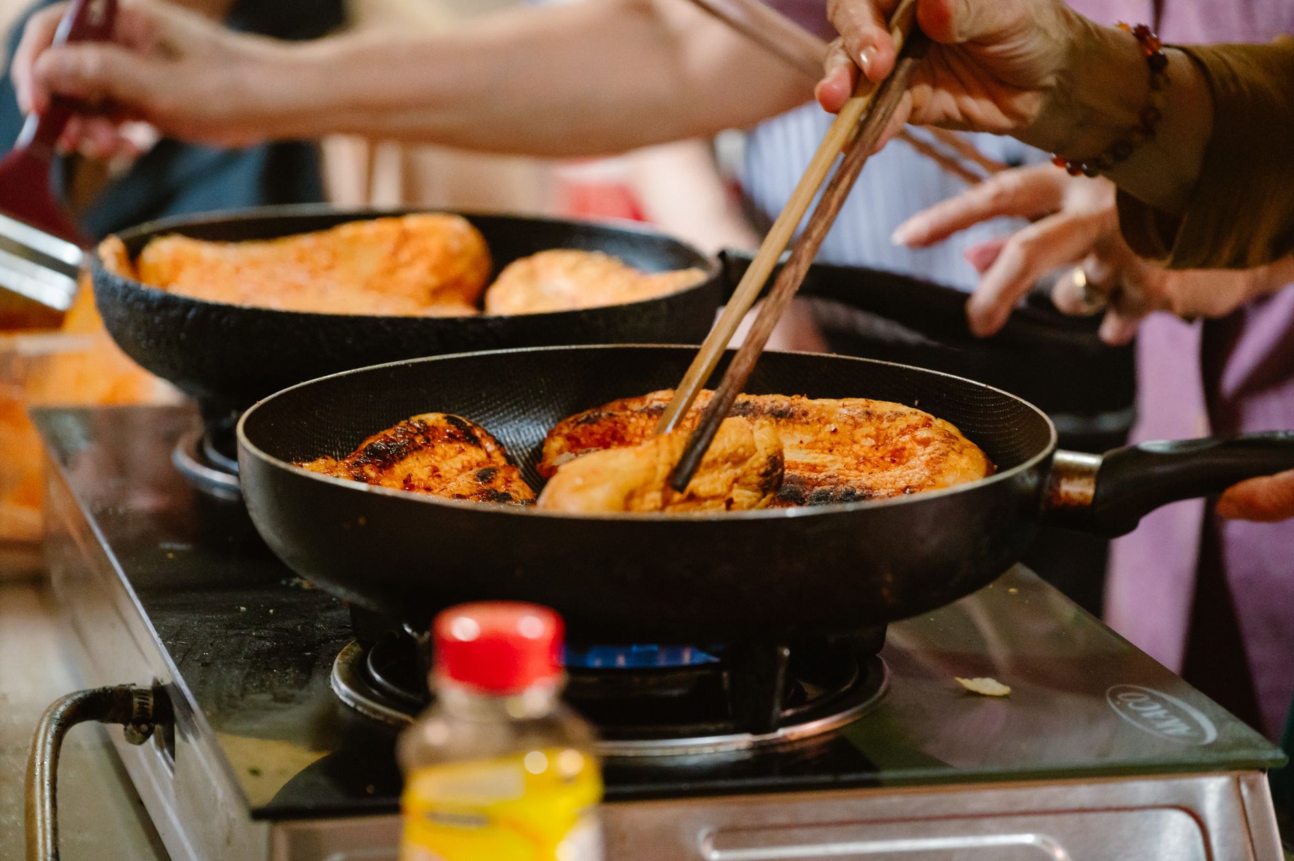 Cooking with chopsticks in frying pans