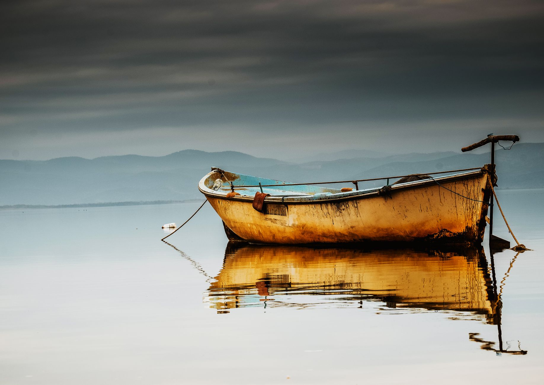 A small boat on calm water