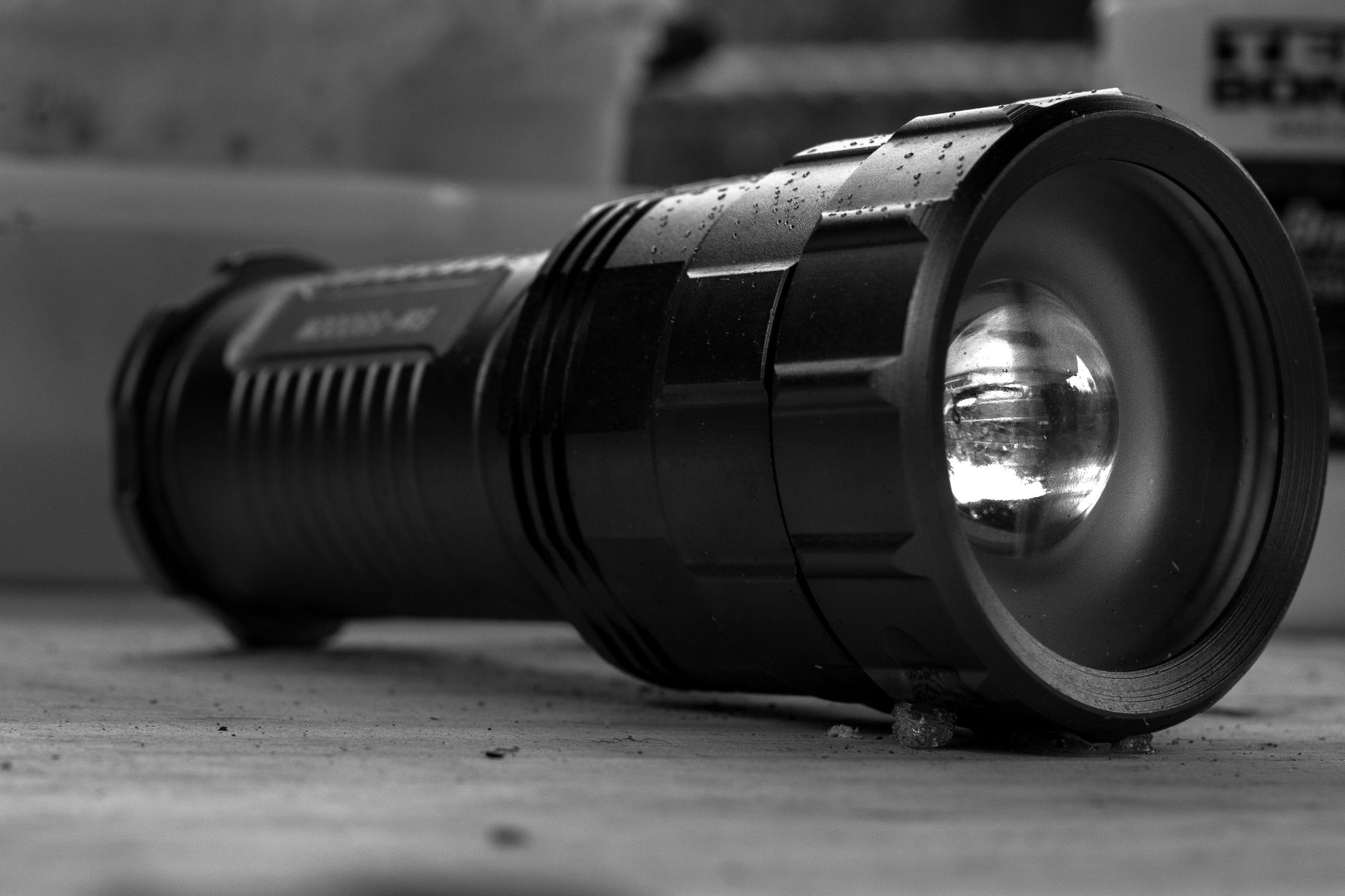 A flashlight resting on a table