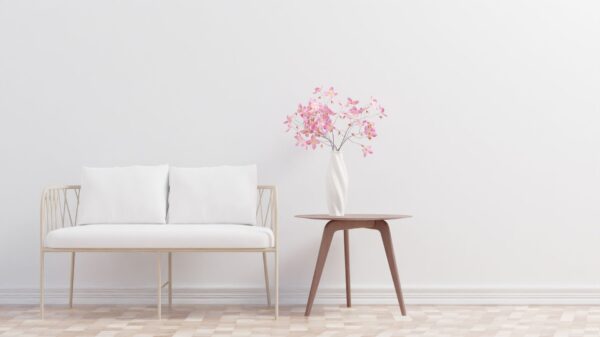 Best cord cover: a tidy living room with a plain white wall
