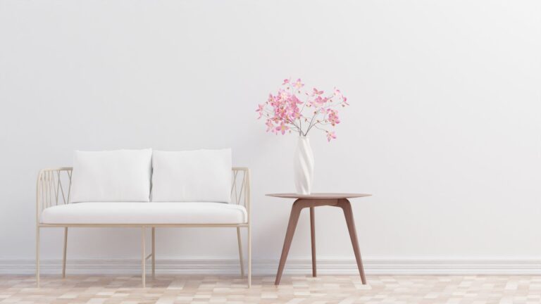 Best cord cover: a tidy living room with a plain white wall