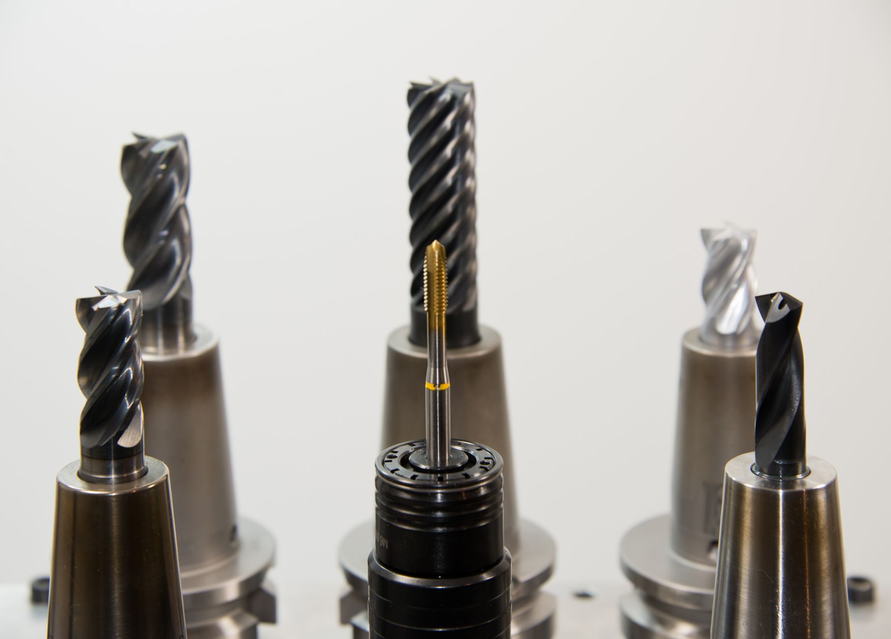 Drill bits standing in holders