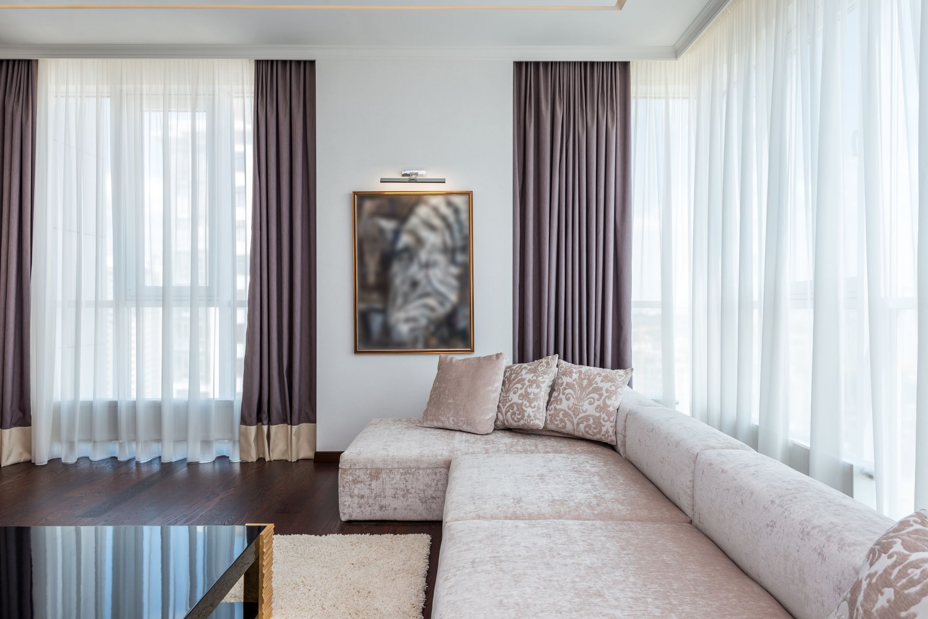 Best curtain rod: curtains hanging on a rod over a living room window