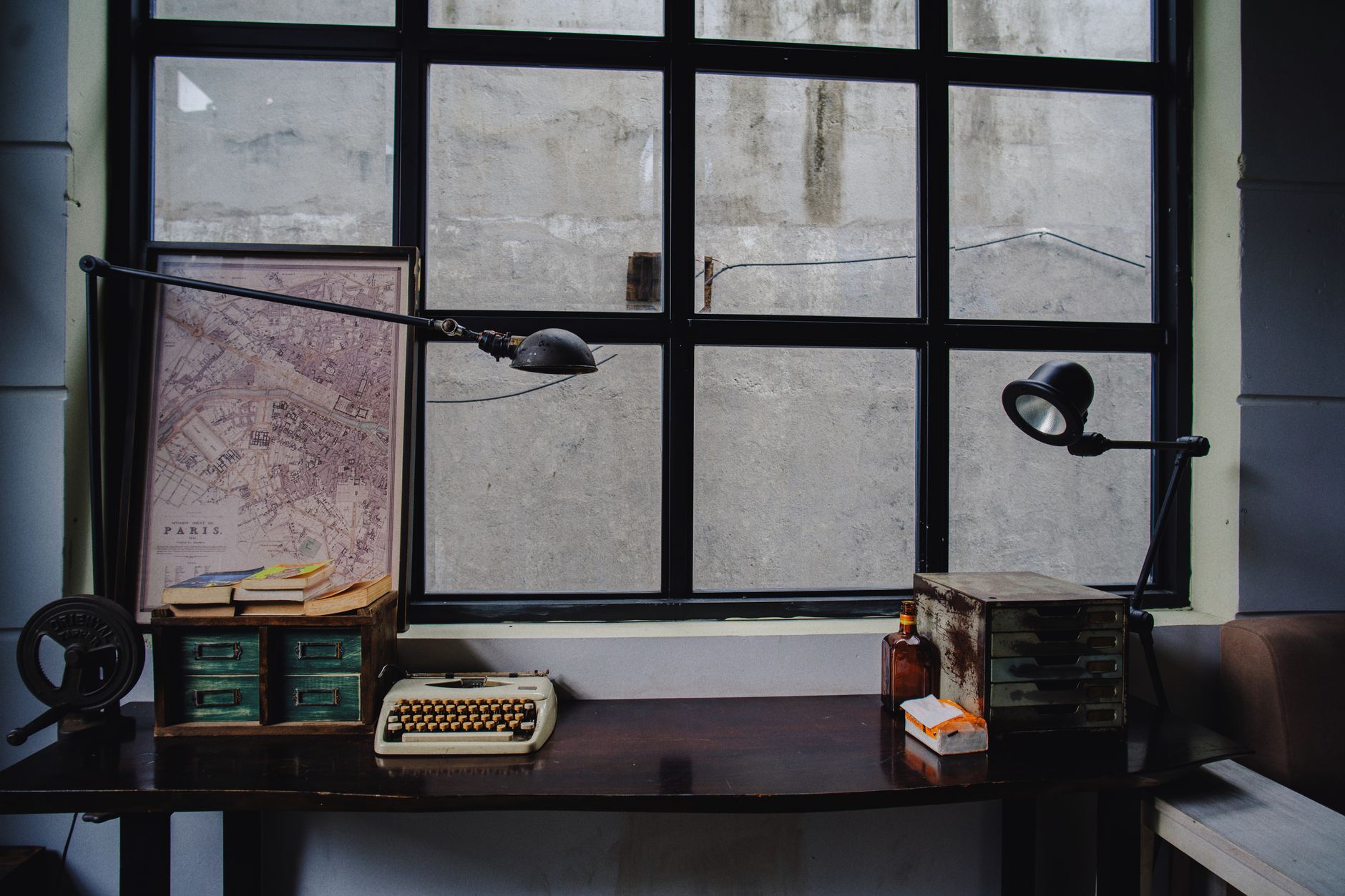 A home desk set up for work by a window