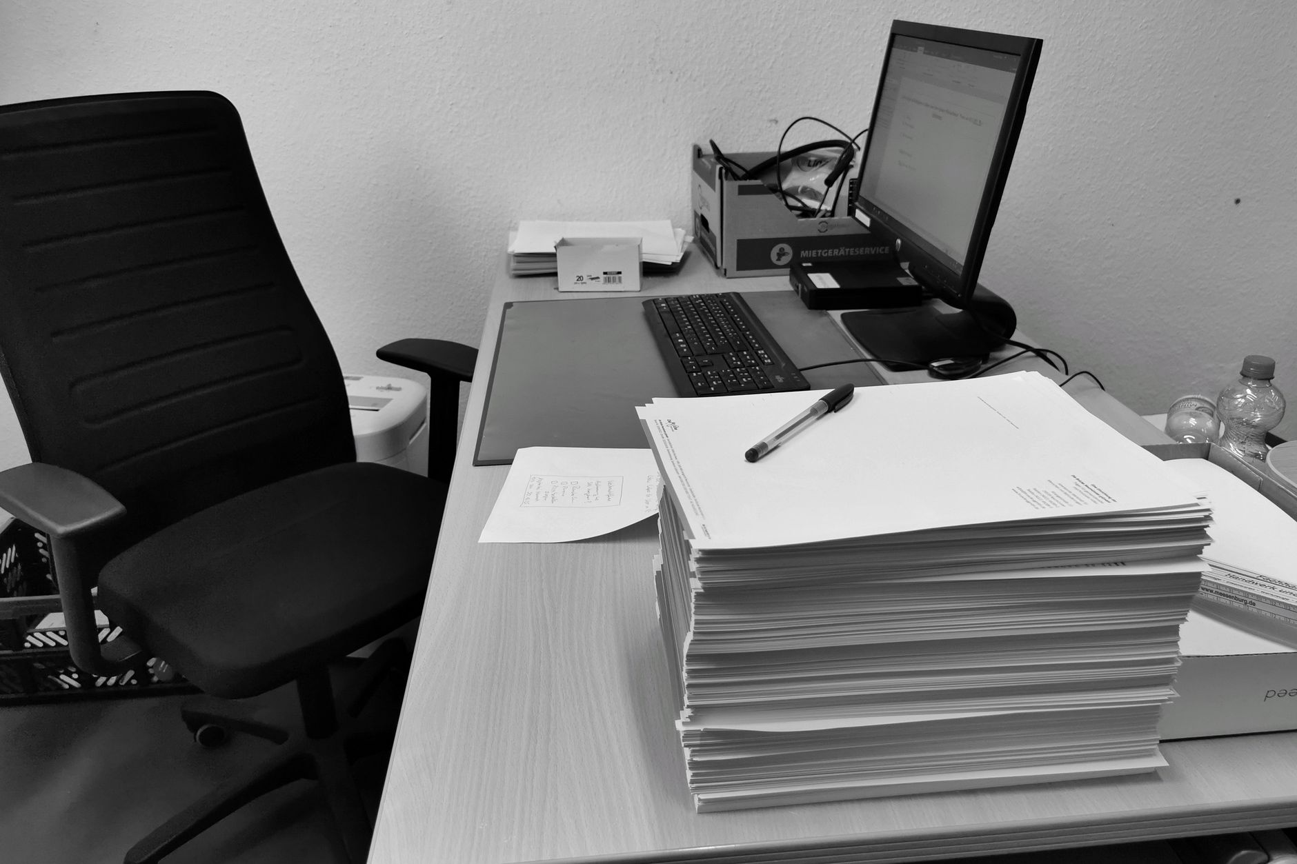 Papers and documents on a work desk