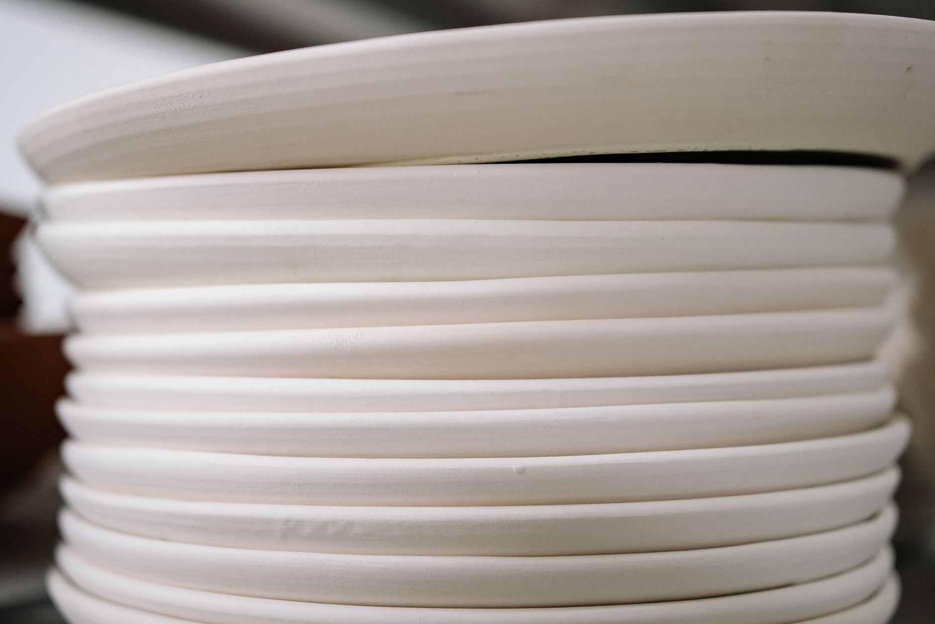 A stack of white plates
