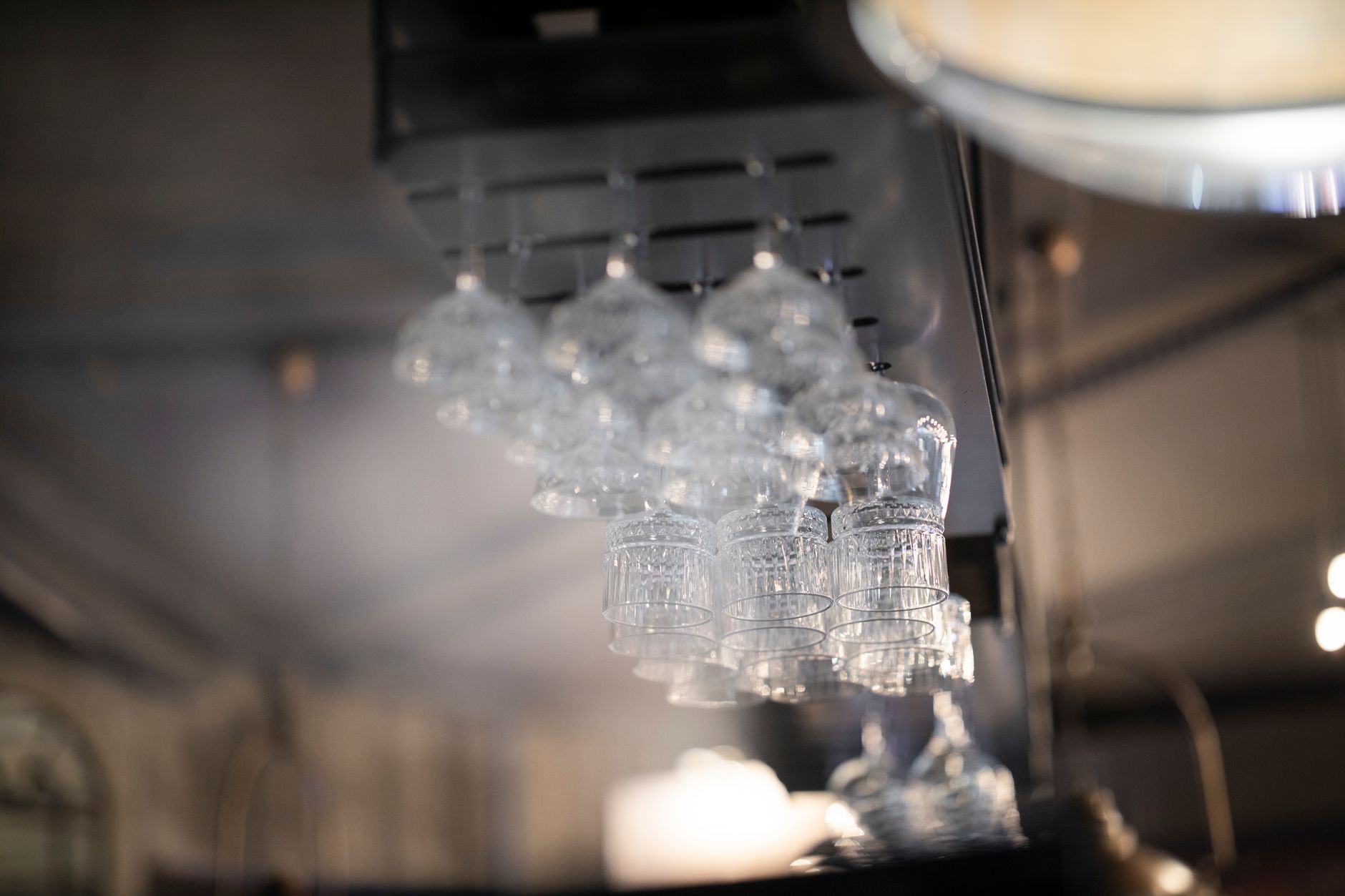 Wine glasses hanging upside down