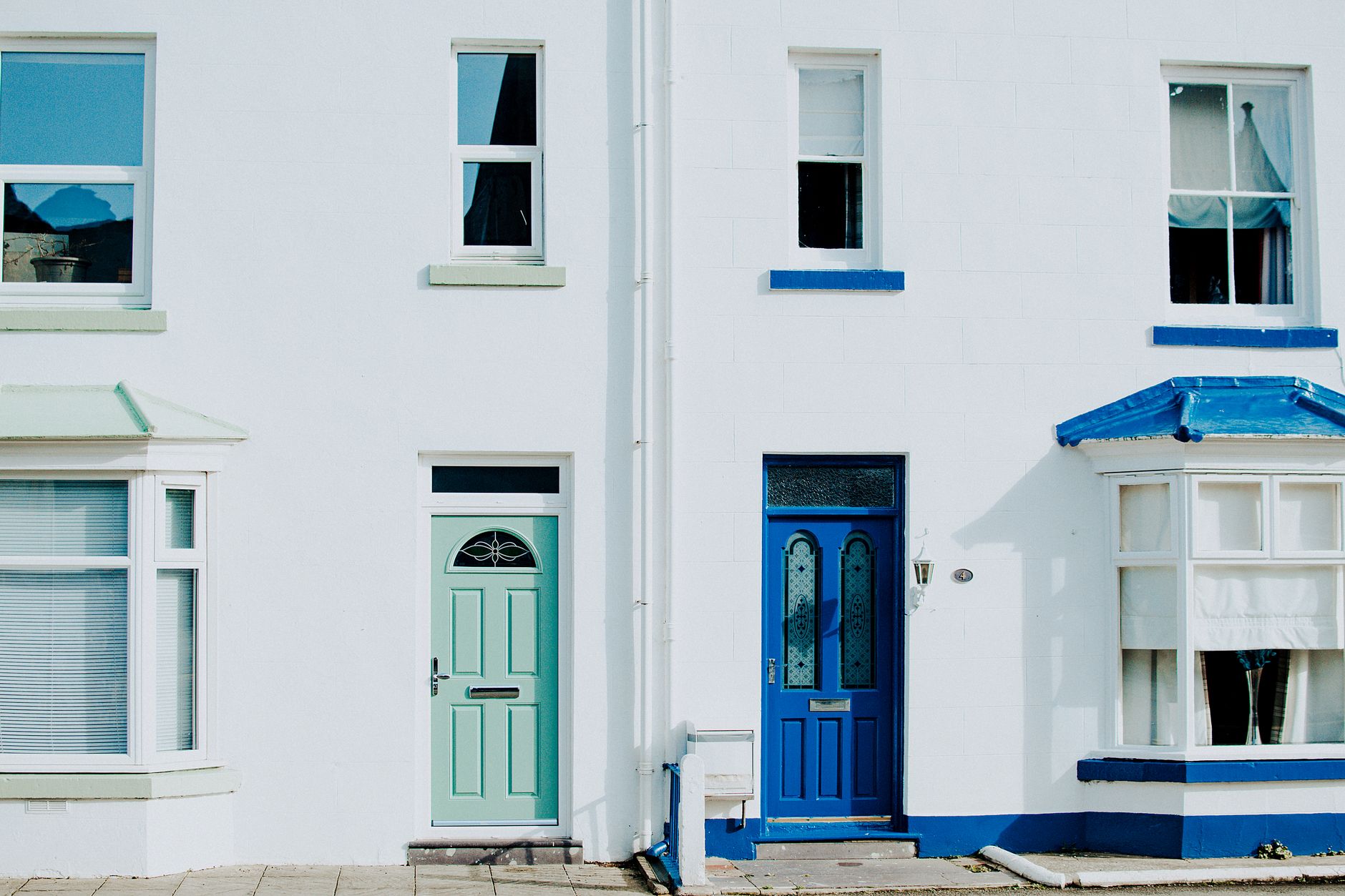 Front doors on a white row house