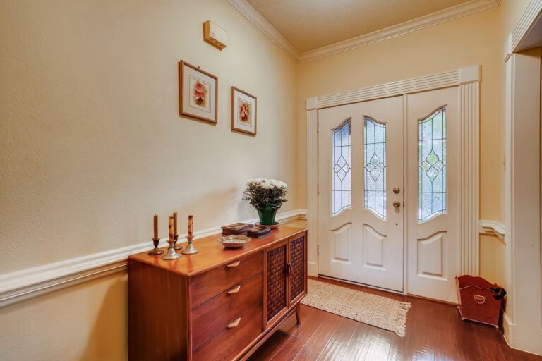 Best door security bar: the inside of a front door in a hallway