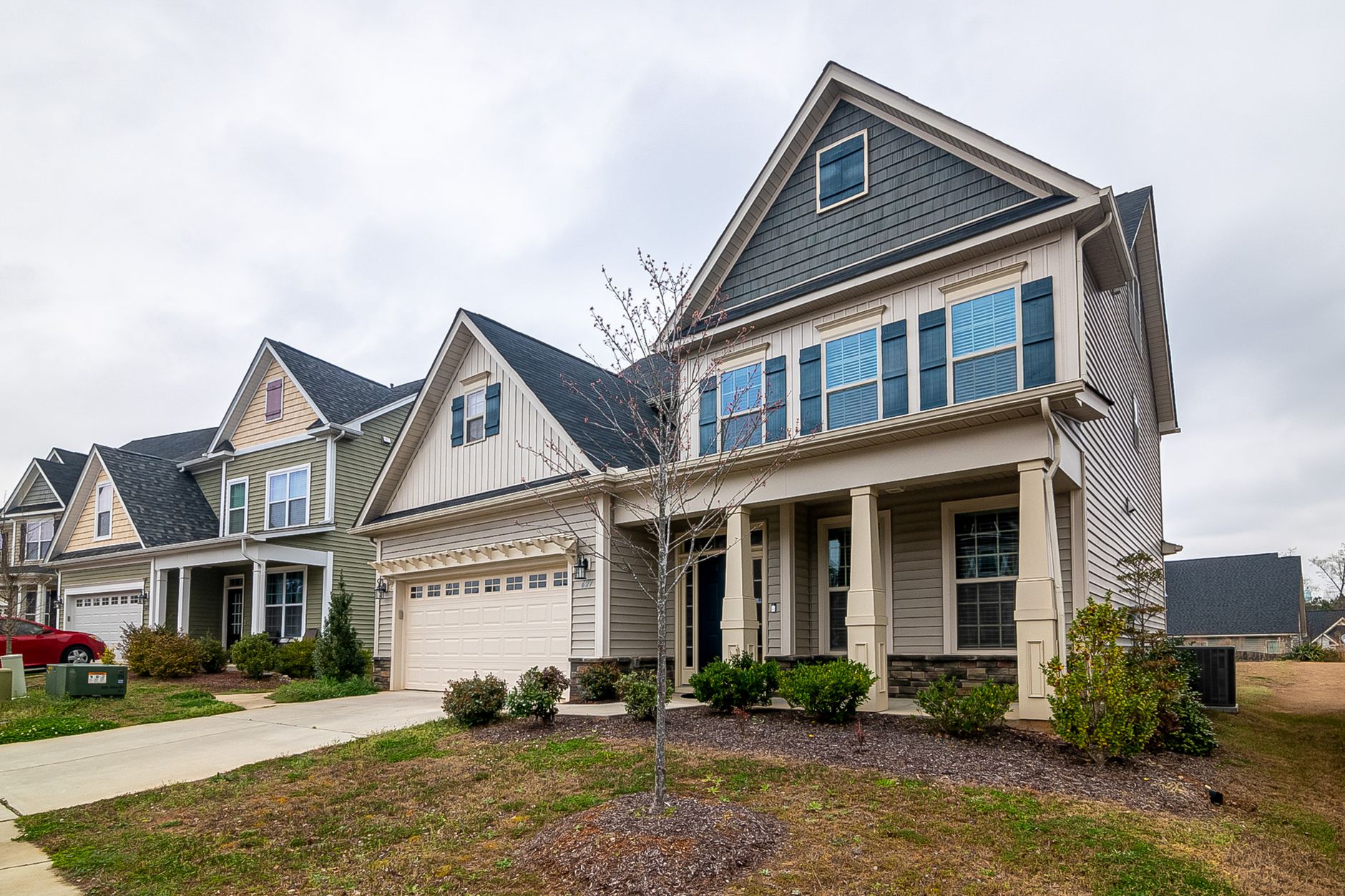 A suburban house with a front lawn