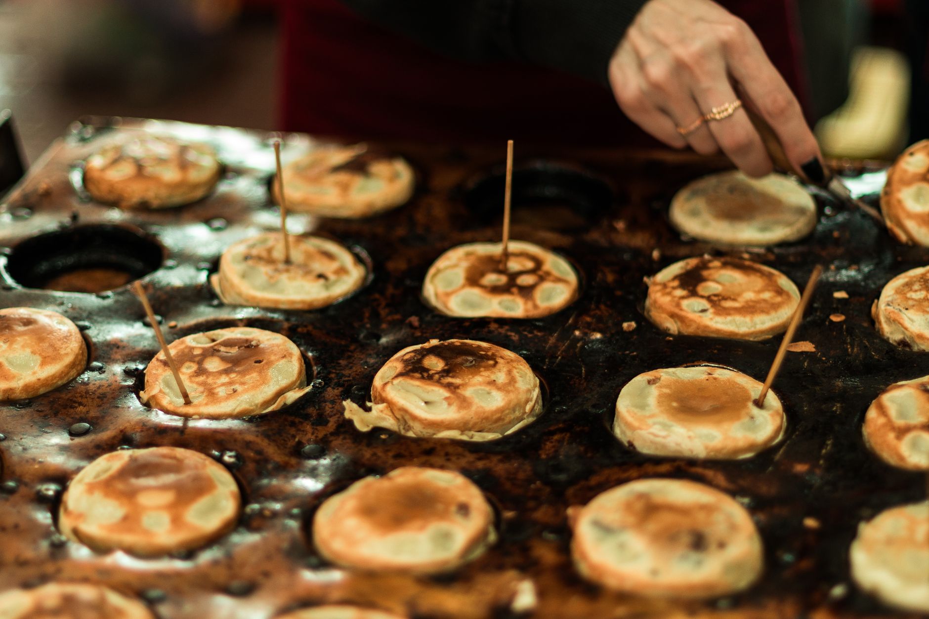 Best electric griddle: small pancakes cooking on a griddle pan
