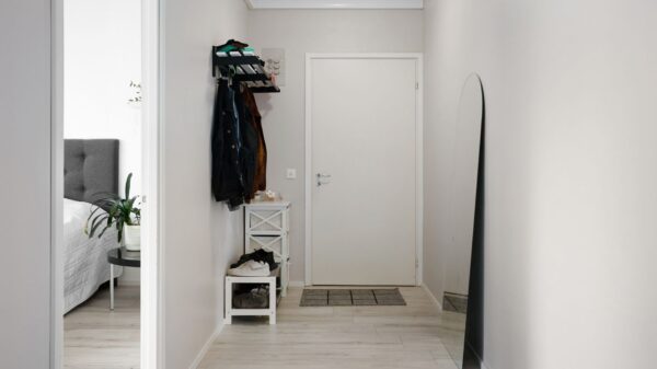 Best entryway bench: a bench with shoes stored beneath it near a front door