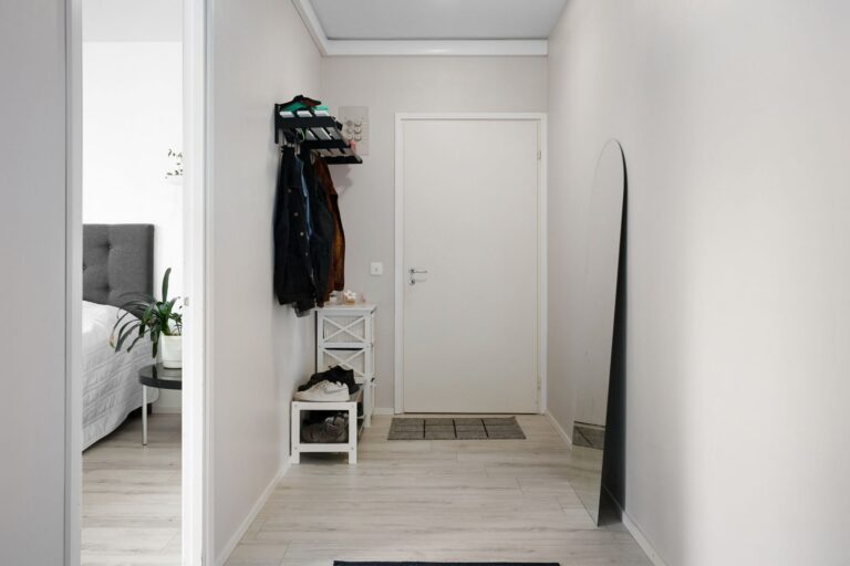 Best entryway bench: a bench with shoes stored beneath it near a front door