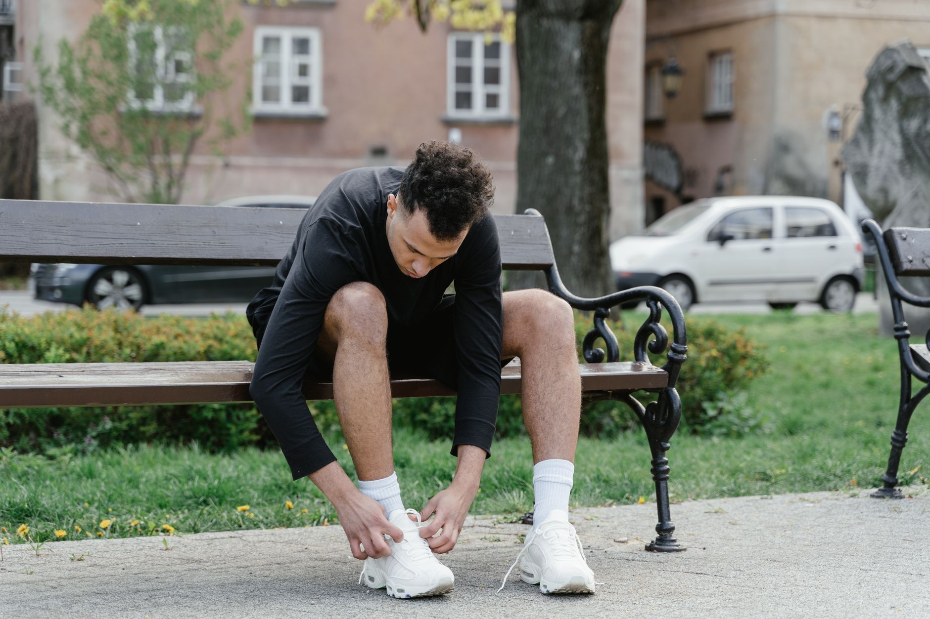 A person tying their shoes
