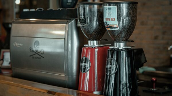 Best espresso grinder: espresso grinders beside an espresso machine