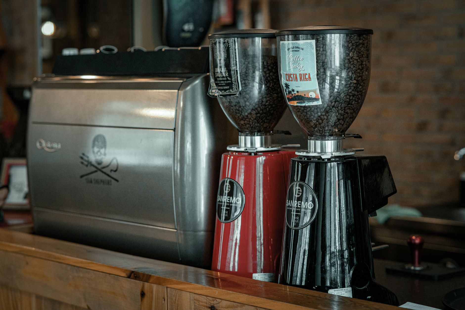 Best espresso grinder: espresso grinders beside an espresso machine