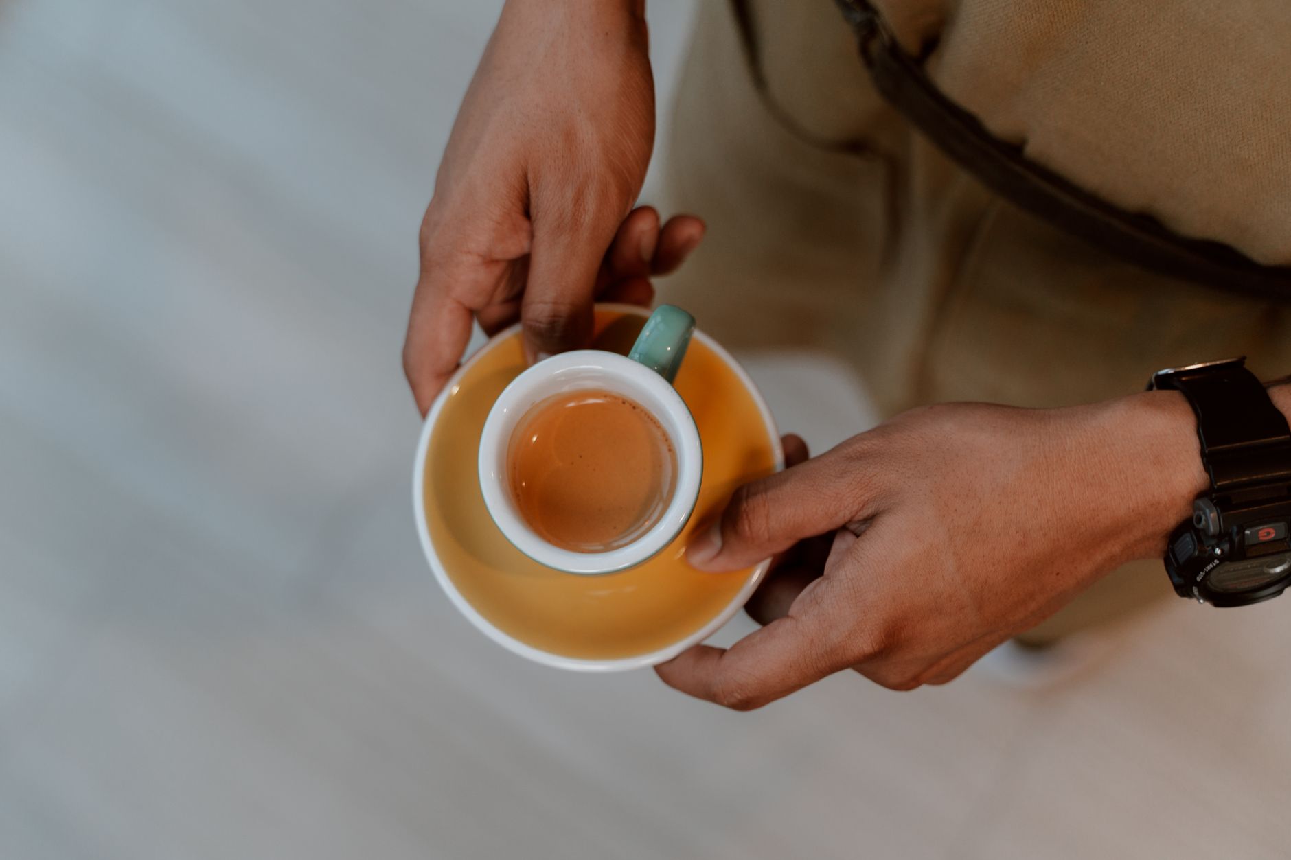 A freshly pulled espresso shot in a small cup