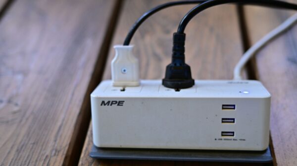 Best extension cord for freezer: plugs in a power strip on a deck