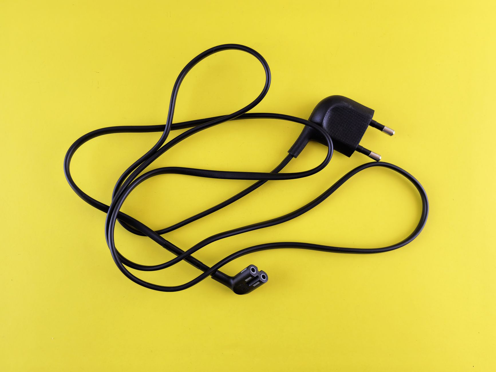 A power cord with a two-prong plug
