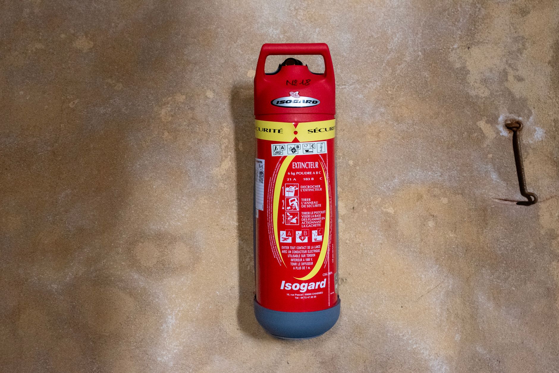 A red fire extinguisher