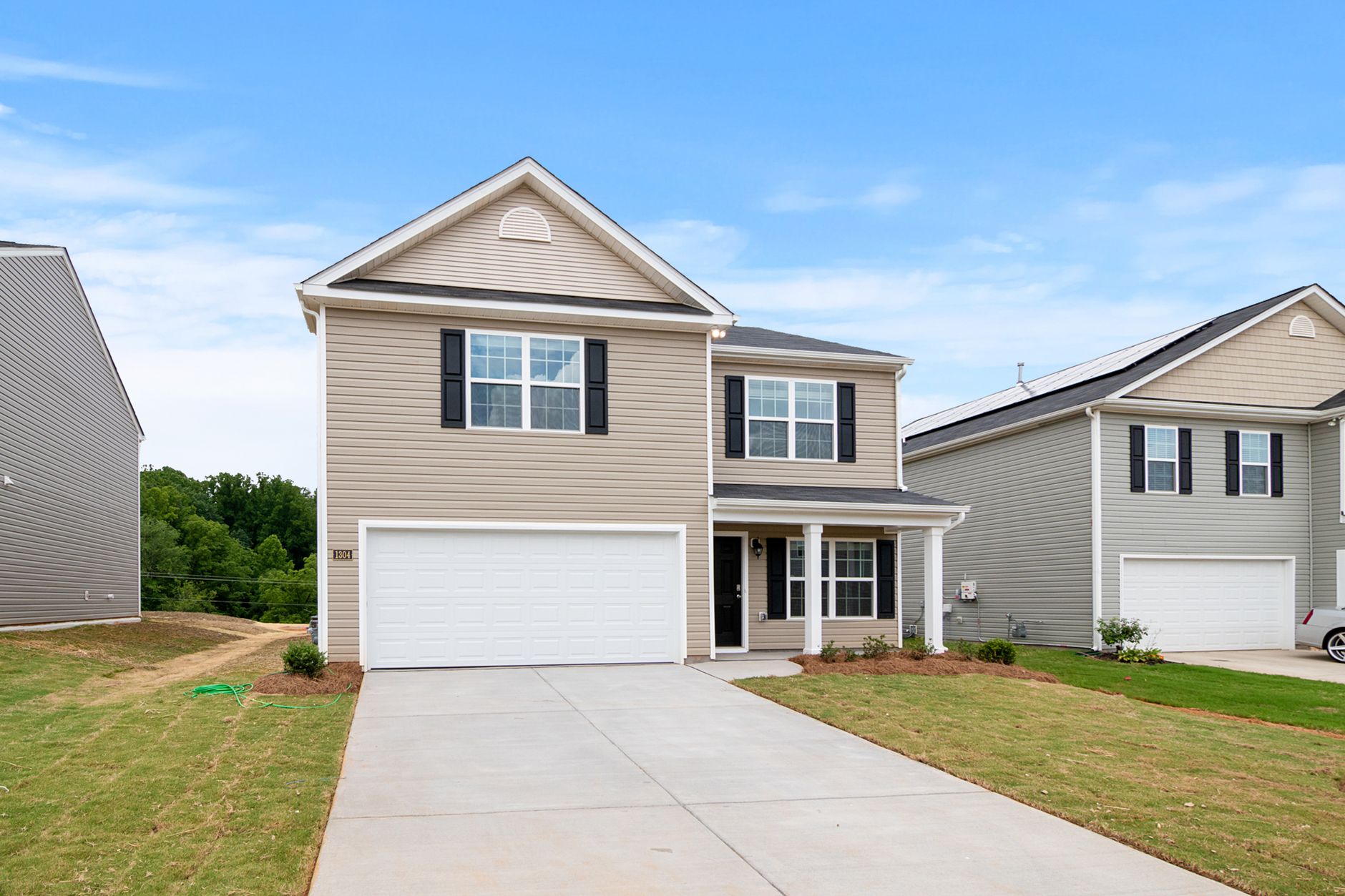 A two-story house with a garage