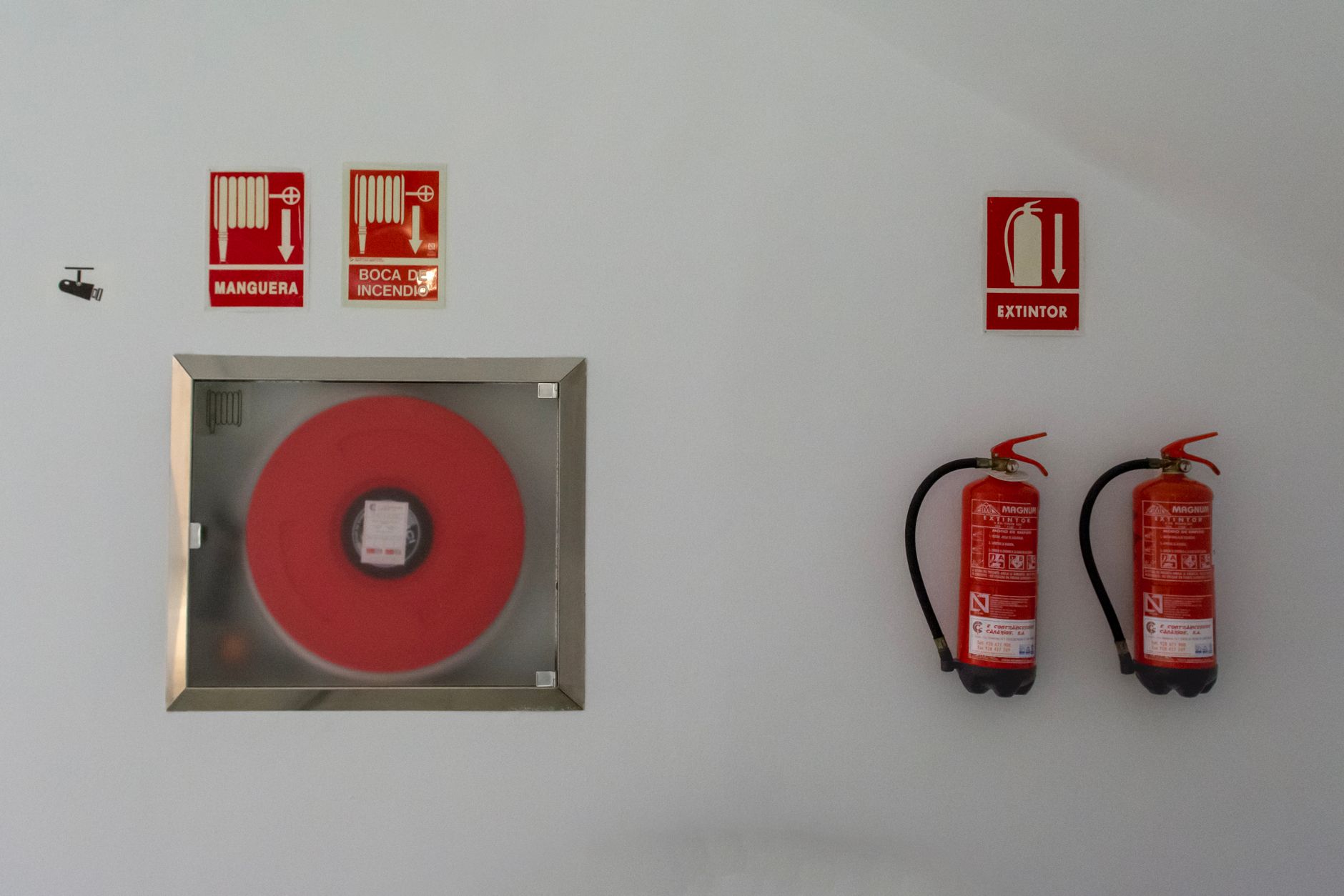 Fire extinguishers mounted on a wall