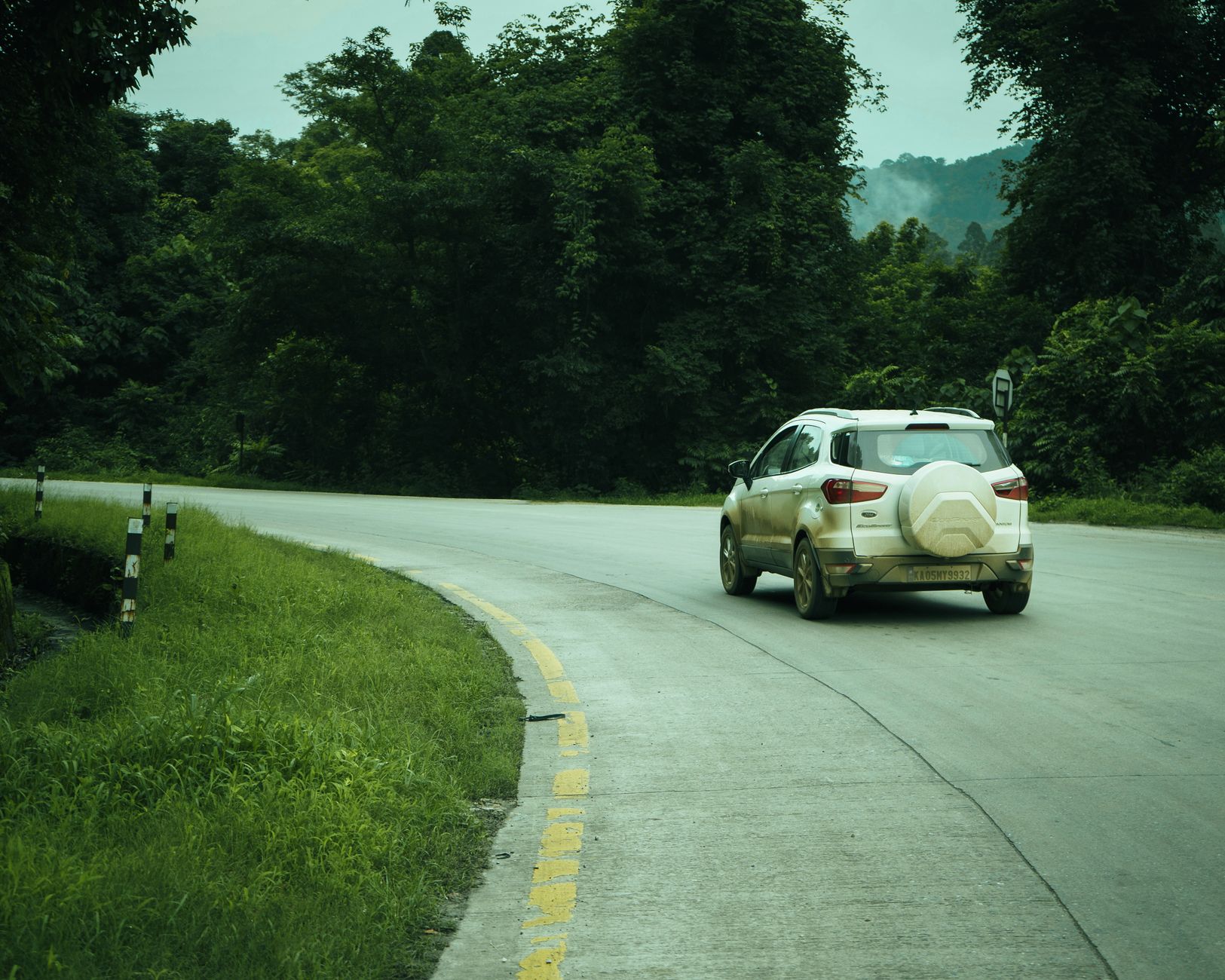 An SUV on a winding road