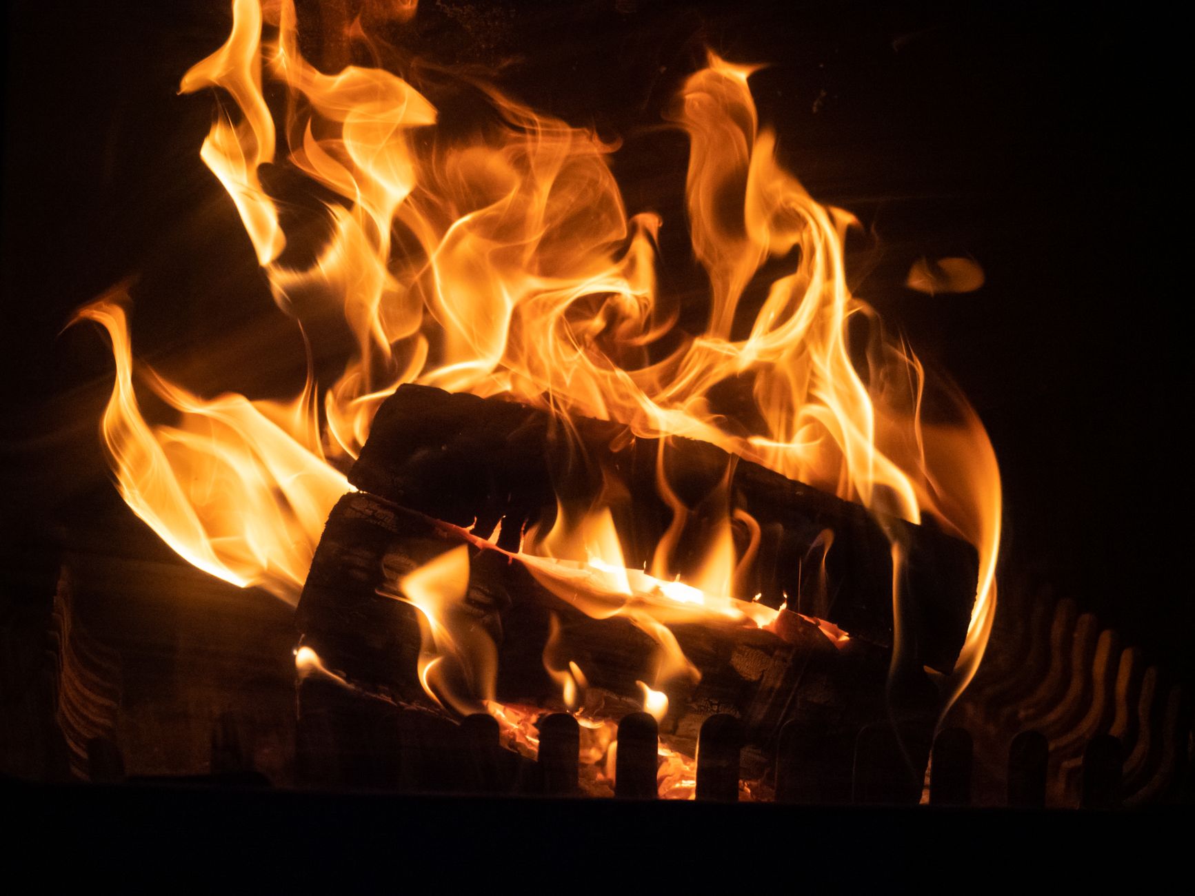 Logs burning in a fireplace