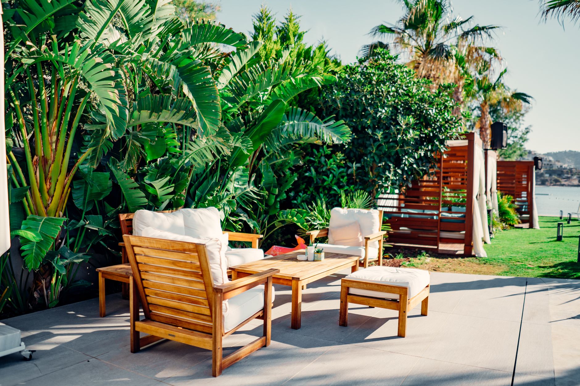 Outdoor furniture set out on a backyard patio