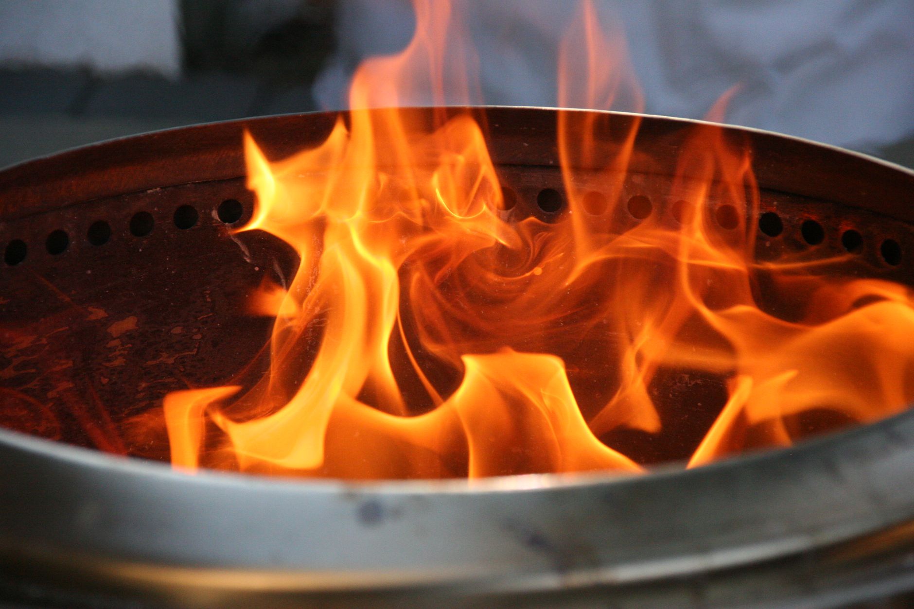 Flames in a steel fire pit