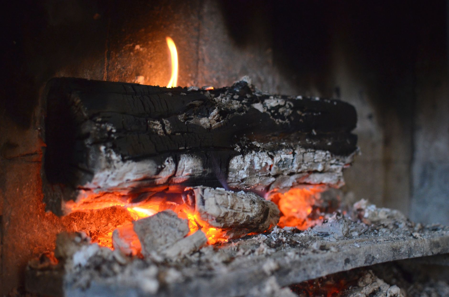 A wood fire burning in a fireplace