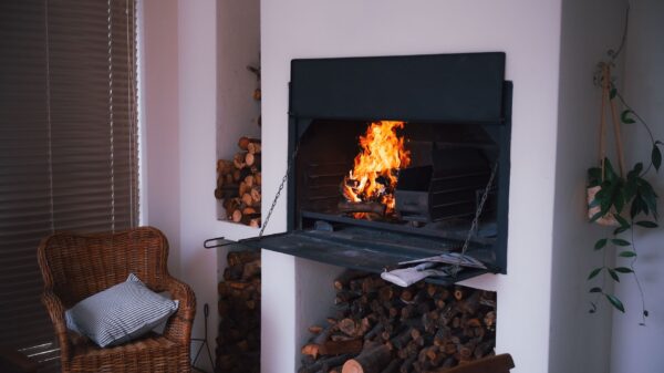 Best fireplace lighter: a fire in a fireplace with stacked wood