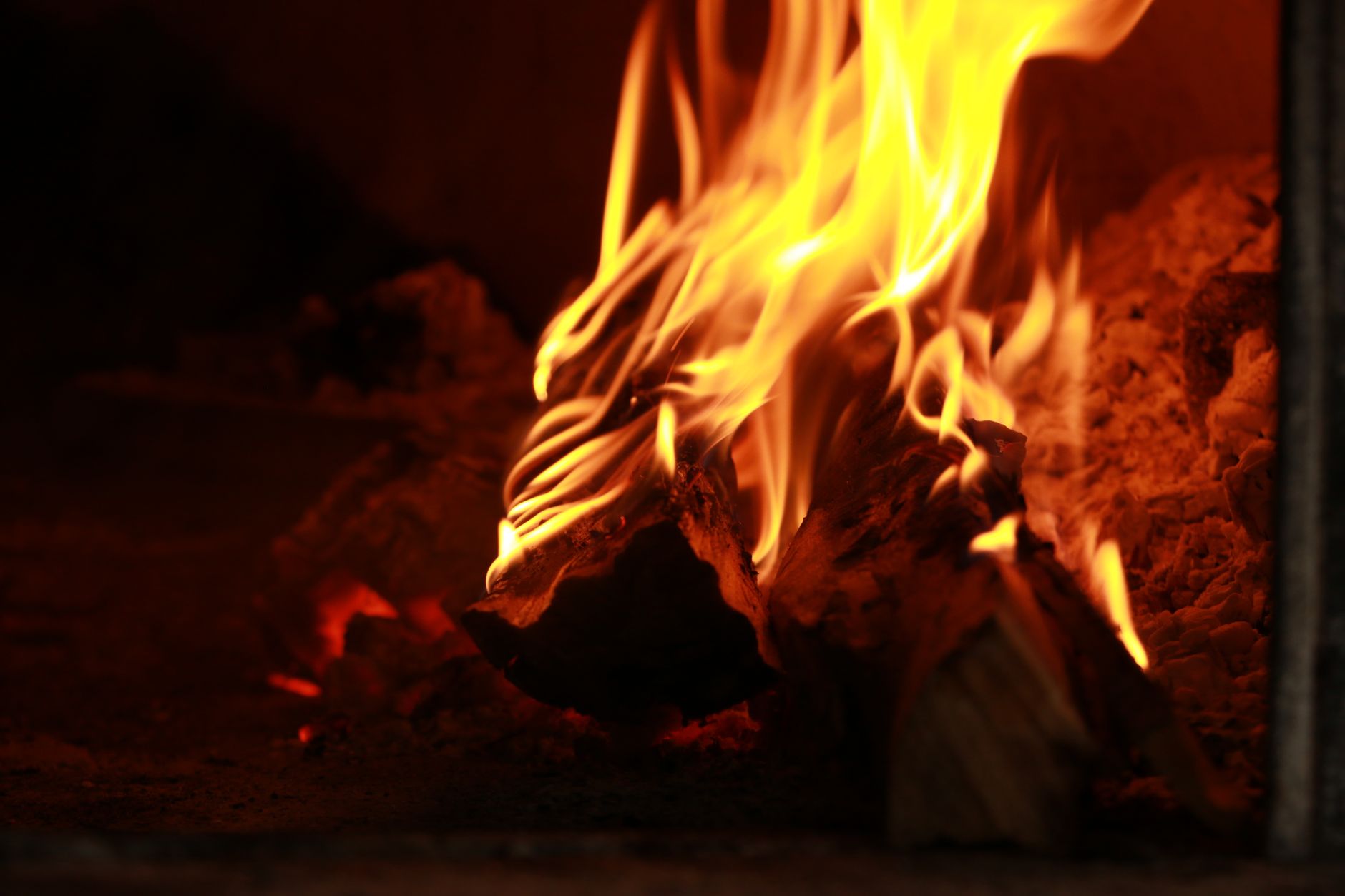 Flames from a wood fire in a fireplace