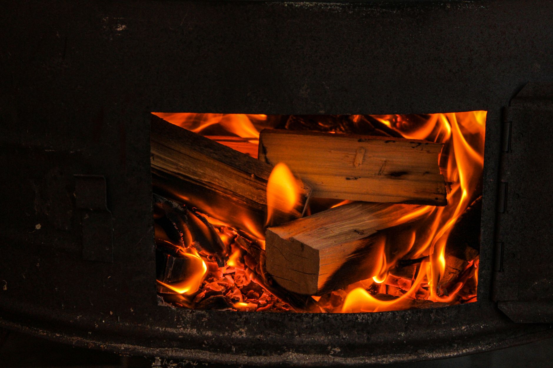 A fire burning in a wood stove