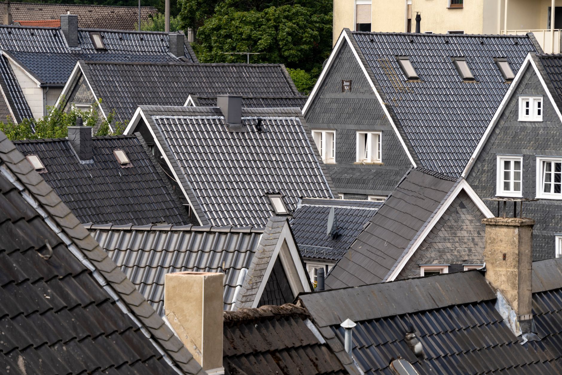 A chimney on the roof of a house