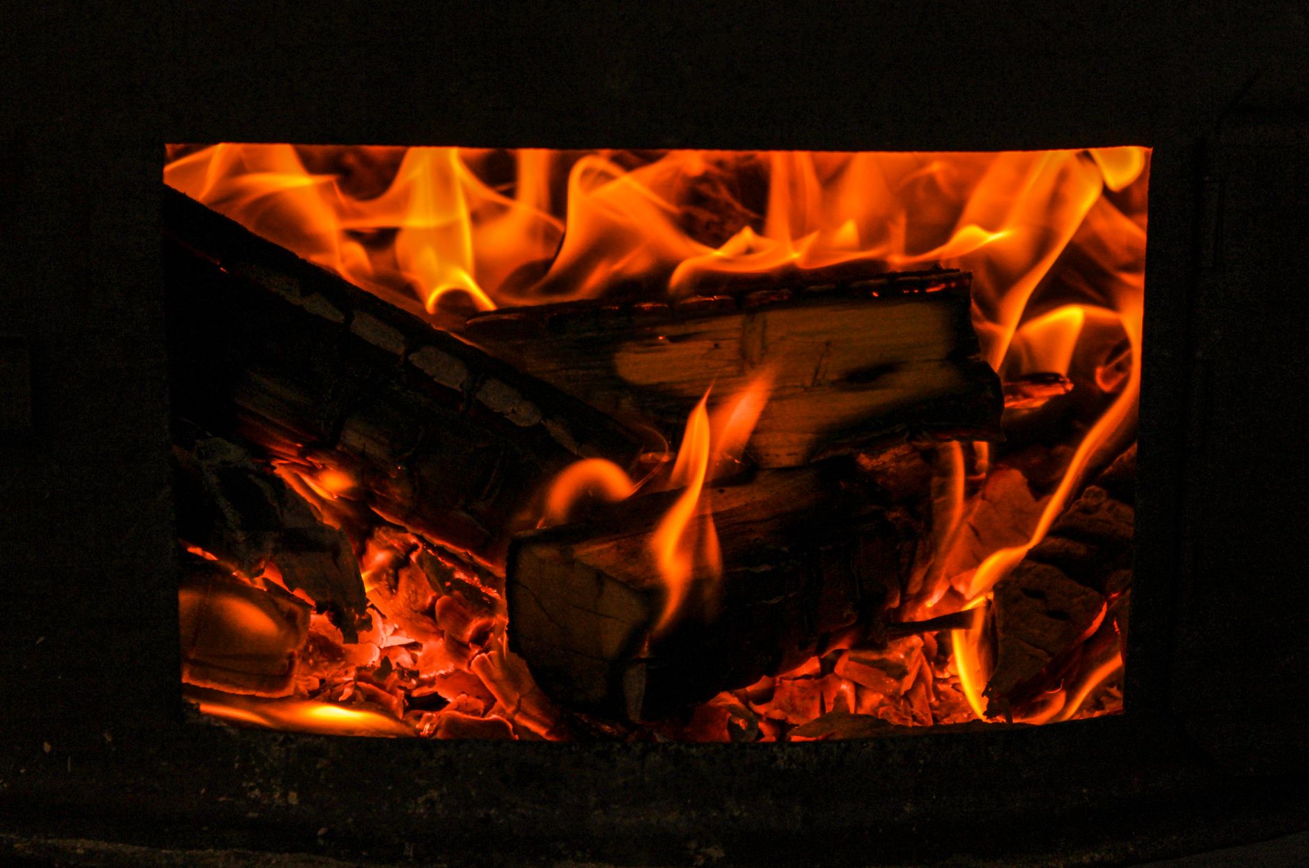 A fire burning in a wood stove