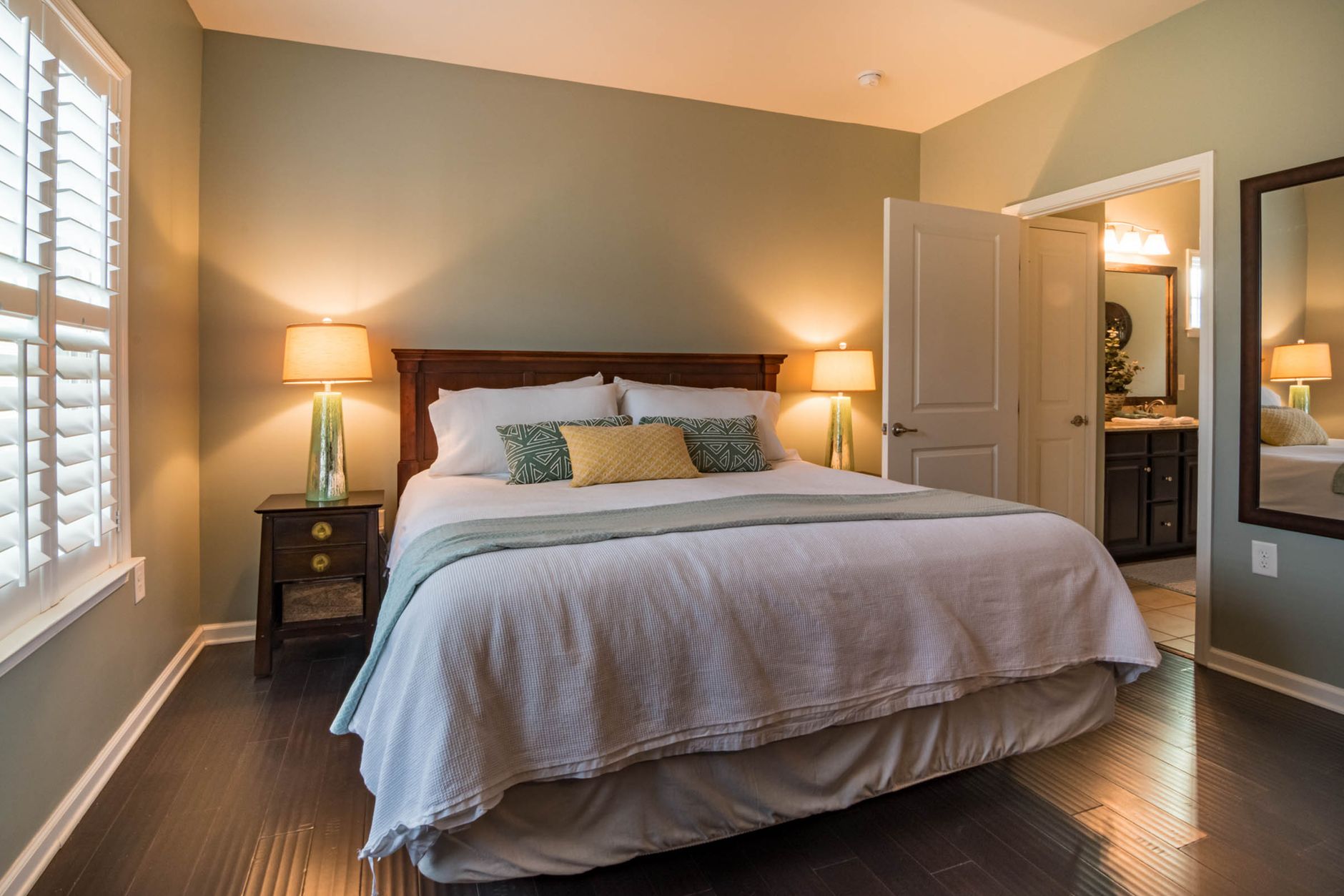 A softly lit bedroom in the evening