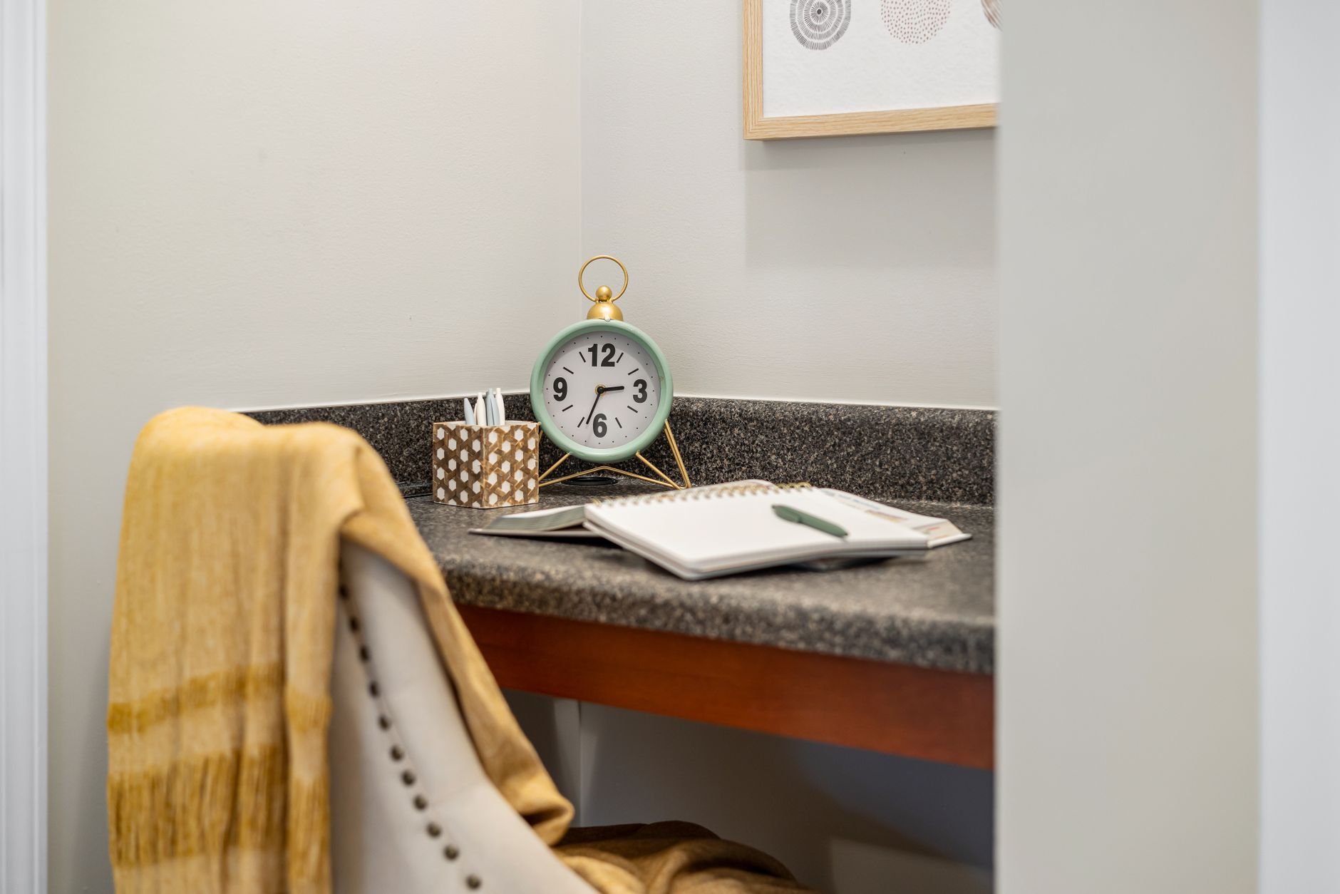 A home office corner with a desk and chair