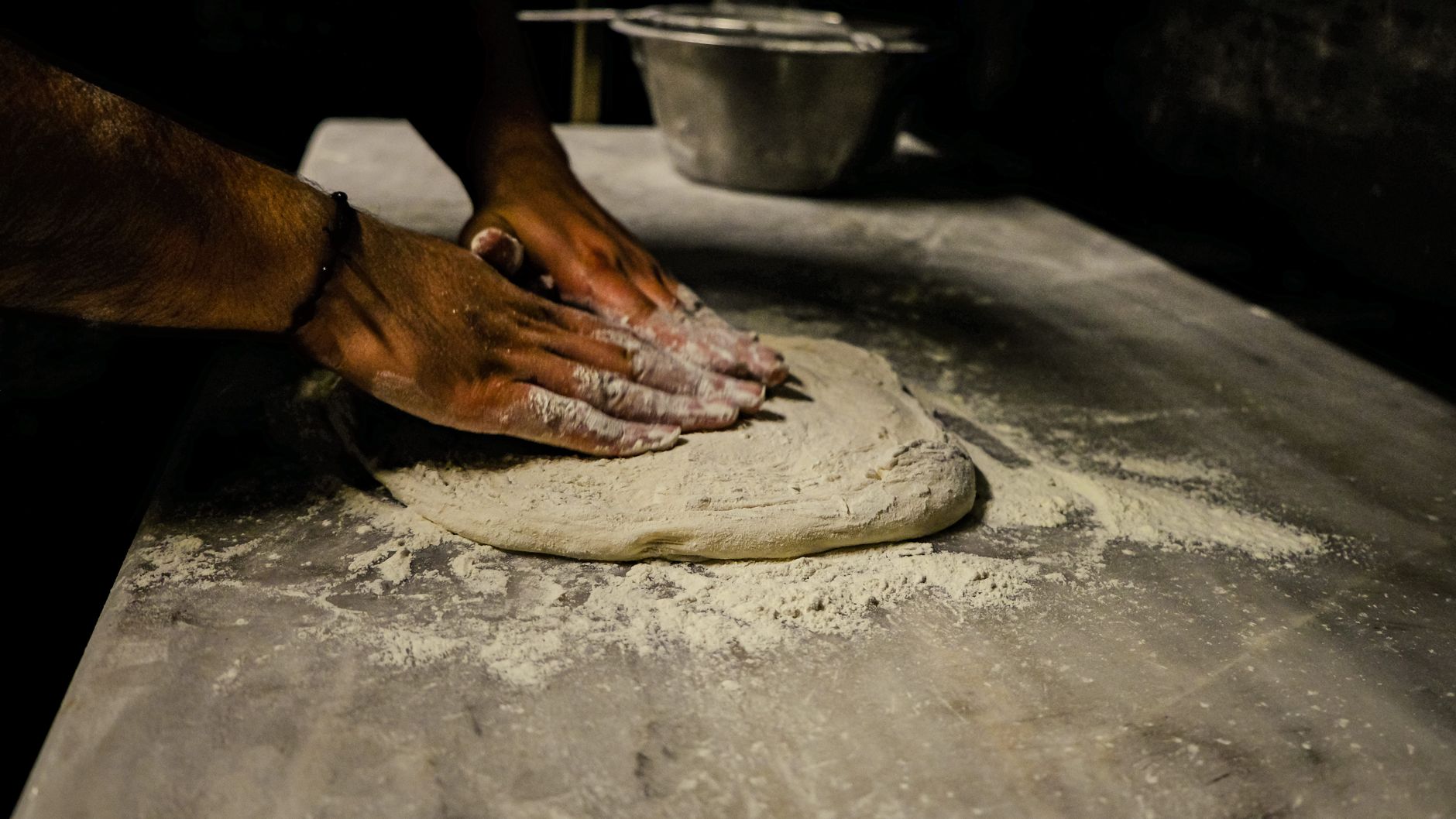 Homemade dough on a floured surface