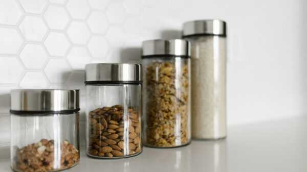 Glass jars of nuts and grains on a counter
