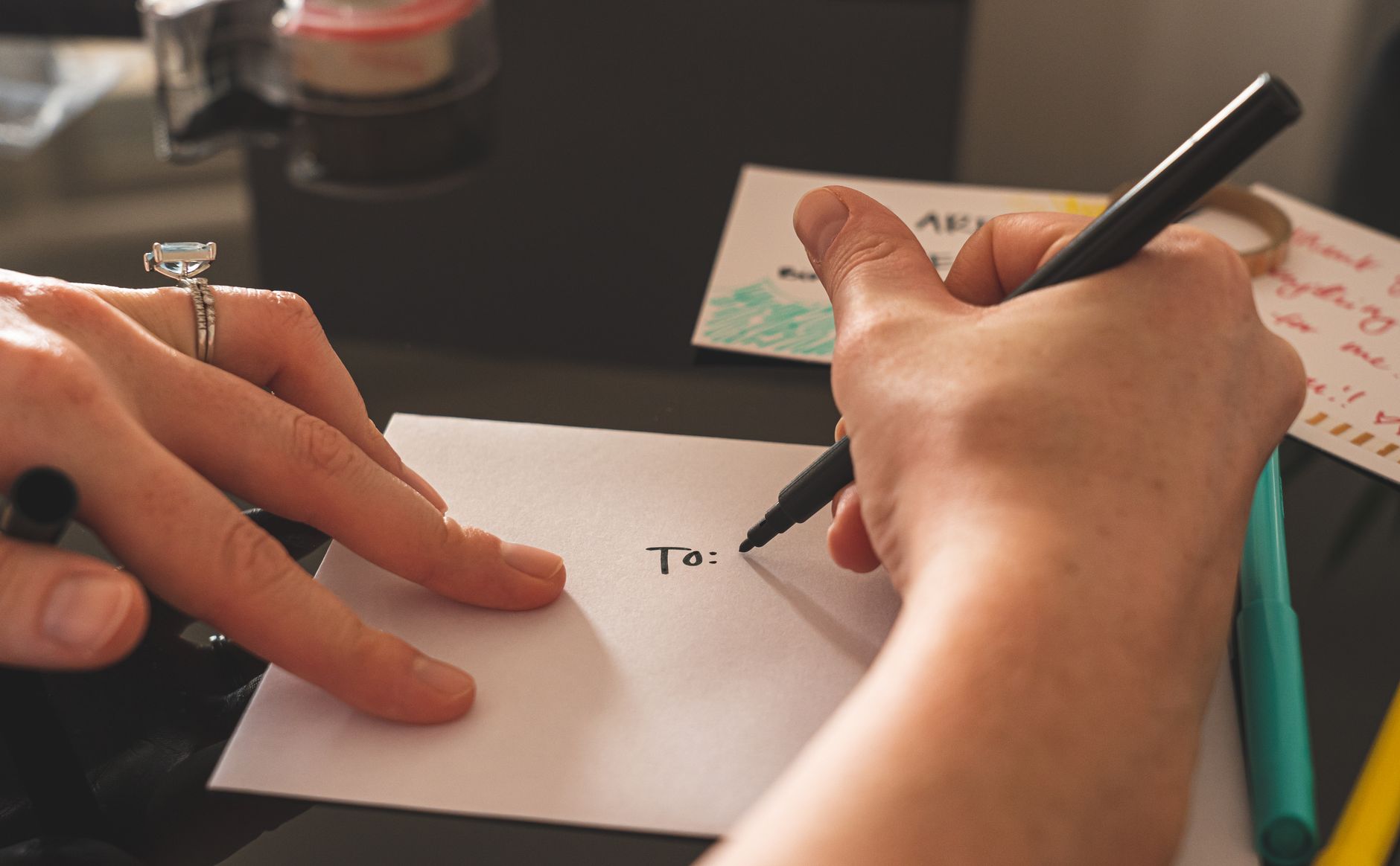 Writing on a label with a pen