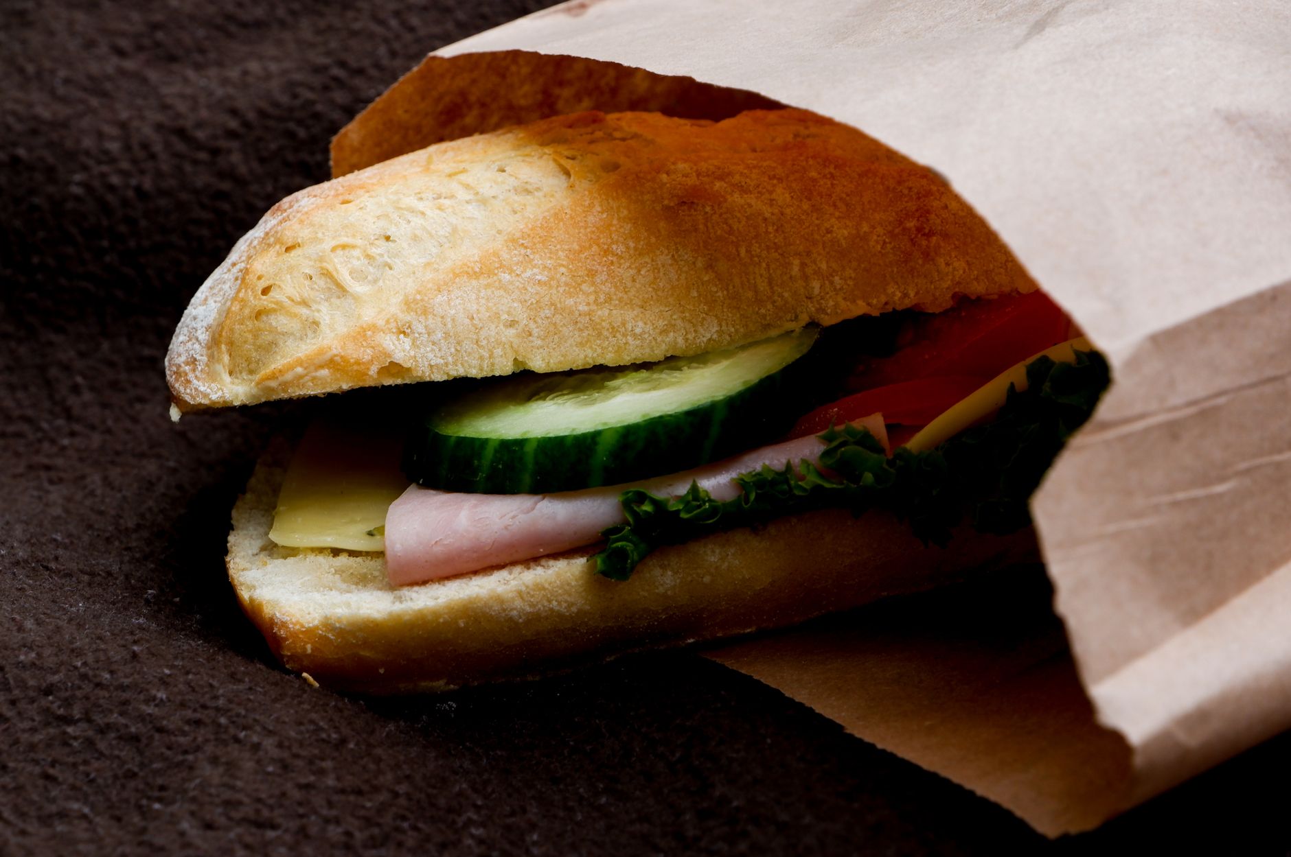 A sandwich in a paper bag