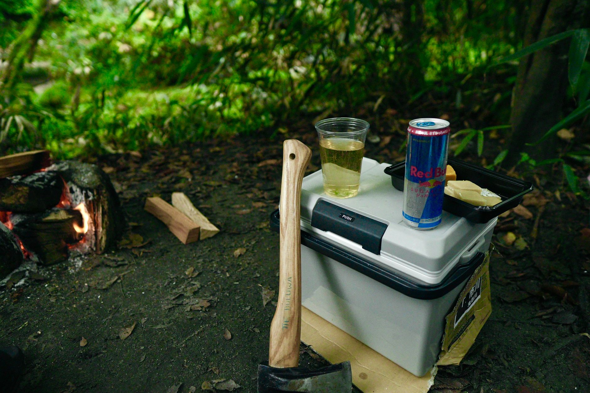A cooler at a campsite