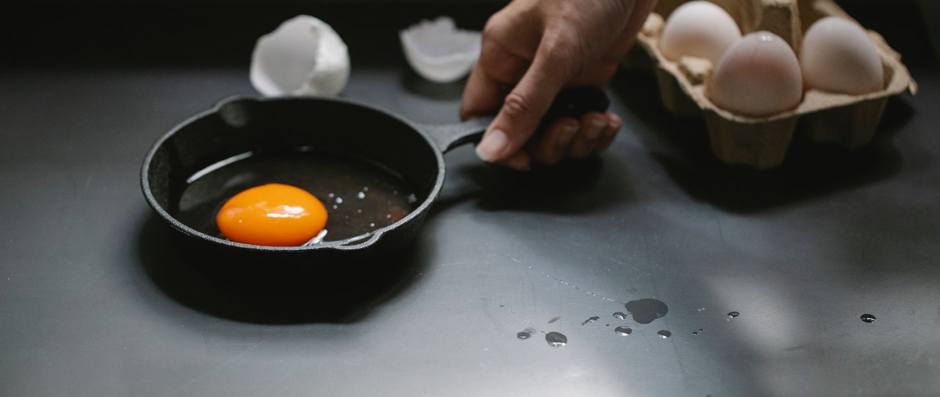 Egg frying in a small skillet