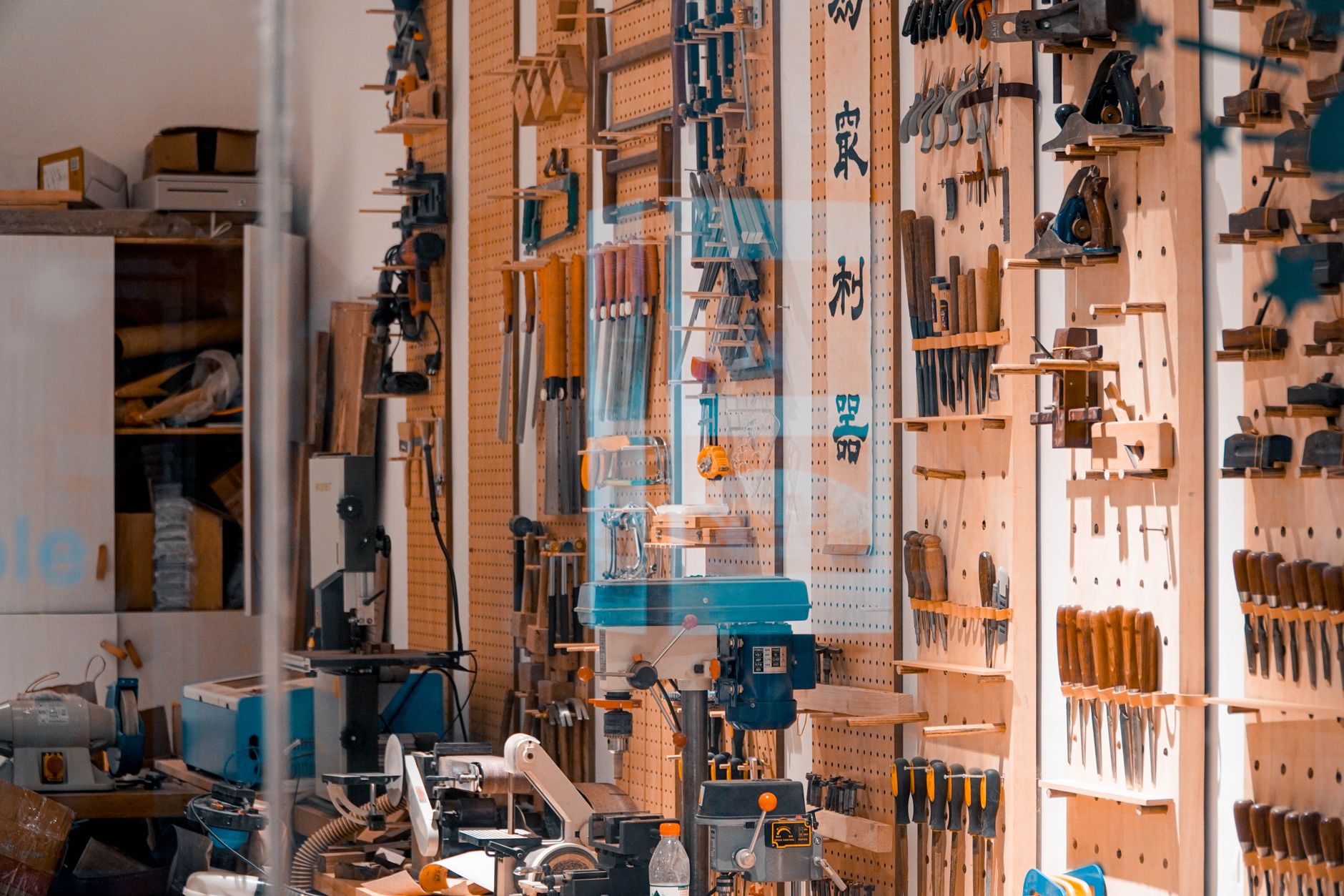 A workshop wall full of hand tools