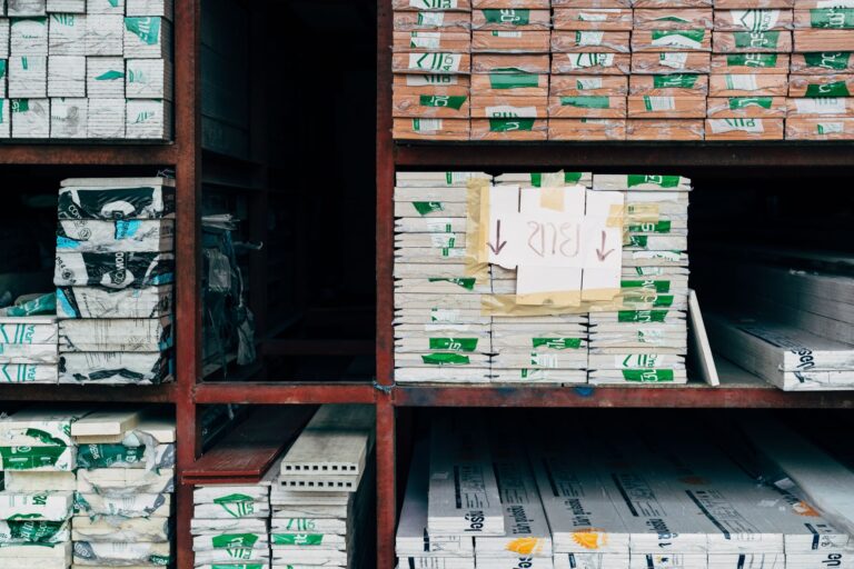 Metal shelves stacked with boxed materials