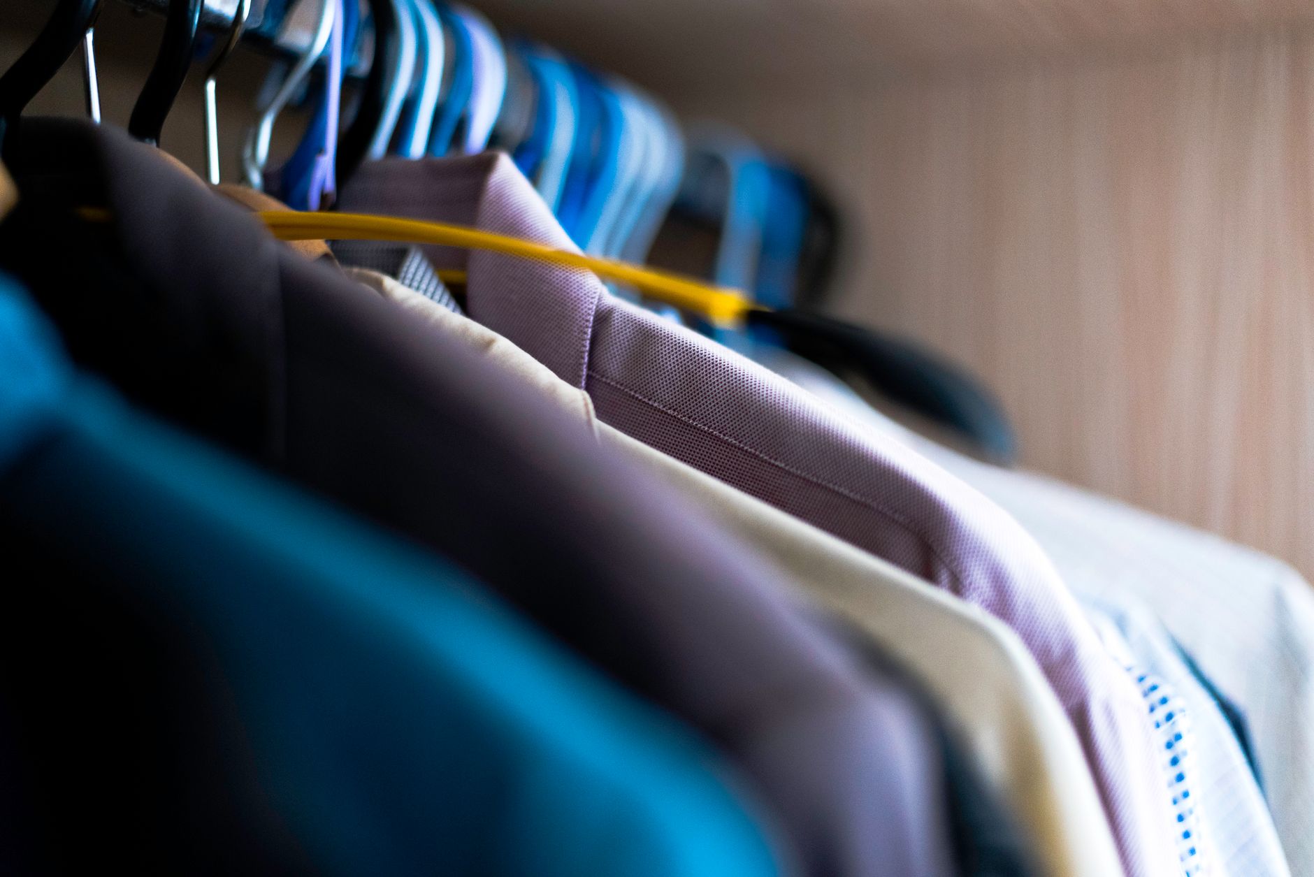 Shirts hanging in a closet