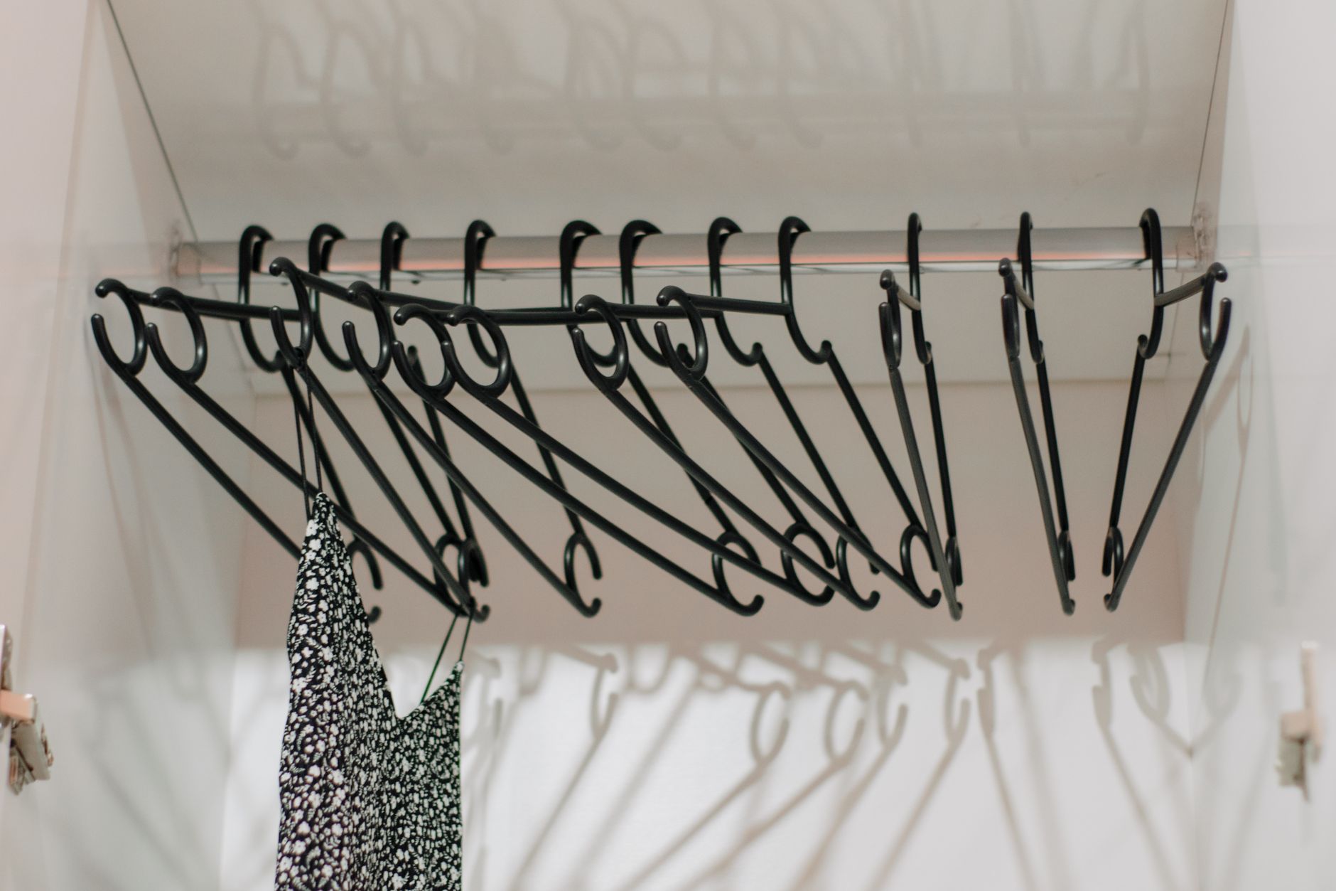 Empty hangers on a closet rod