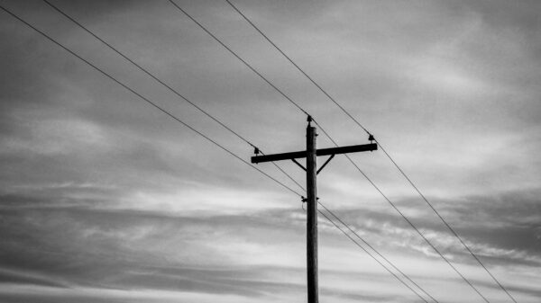 Best generator cord: power lines against a cloudy sky