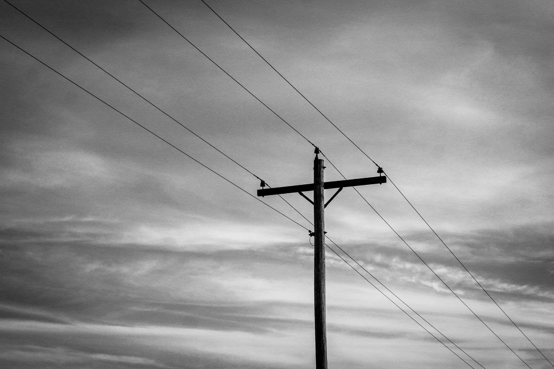 Best generator cord: power lines against a cloudy sky